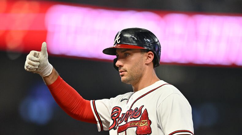 Braves' first baseman Matt Olson celebrates after hitting an RBI single to score Ozzie Albies in the sixth inning at Truist Park, Tuesday, Sept. 26, 2023, in Atlanta. The Braves beat the Cubs 7-6.(Hyosub Shin / Hyosub.Shin@ajc.com)