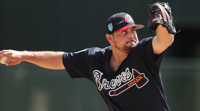 Braves Josh Graham delivers a pitch Feb 19, 2018, at the ESPN Wide World of Sports Complex in Lake Buena Vista, Fla. Curtis Compton/ccompton@ajc.com