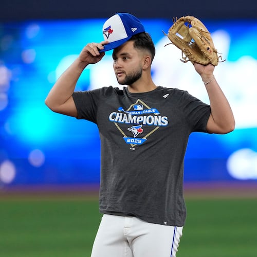 Toronto Blue Jays' Bo Bichette runs drills during a World Series baseball media day, Thursday, Oct. 23, 2025, in Toronto. The Toronto Blue Jays face the Los Angeles Dodgers in Game 1 on Friday. (AP Photo/David J. Phillip)