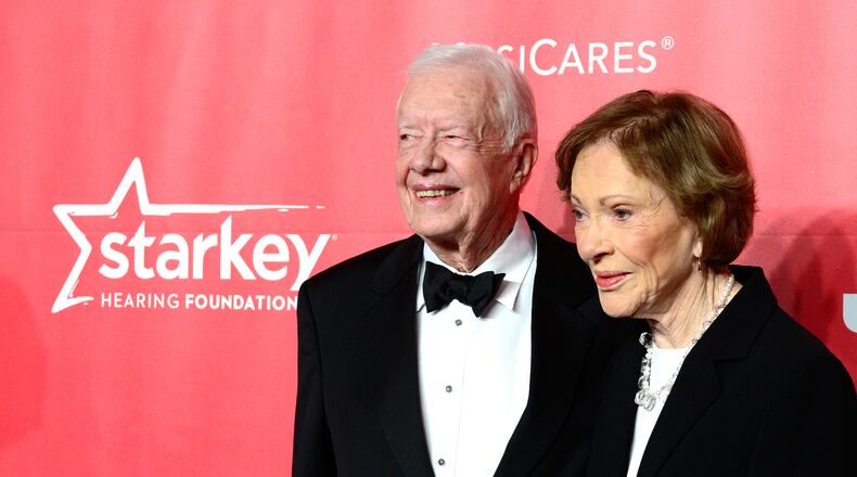 LOS ANGELES, CA - FEBRUARY 06: Former U.S. President Jimmy Carter (L) and former First Lady Rosalynn Carter attend the 25th anniversary MusiCares 2015 Person Of The Year Gala honoring Bob Dylan at the Los Angeles Convention Center on February 6, 2015 in Los Angeles, California. The annual benefit raises critical funds for MusiCares' Emergency Financial Assistance and Addiction Recovery programs. (Photo by Frazer Harrison/Getty Images) Former President Jimmy Carter and wife Rosalynn attended the MusiCares gala. Carter was set to present Dylan with an award. Photo: Getty Images.