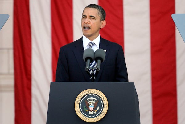FILE - President Barack Obama pays tribute to the nation's war dead during the Memorial Day ceremony at in the amphitheater of Arlington National Cemetery, May 30, 2011. (AP Photo/Jacquelyn Martin, File)
