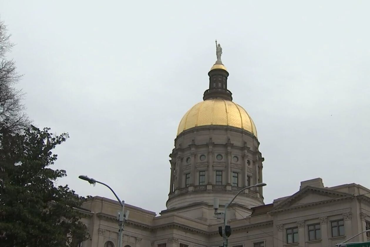 The Georgia state Capitol in Atlanta. Georgia needs to call a special session, redraw the political maps and delay the House primaries if needed, says Rep. Buddy Carter. (Jason Getz/AJC)