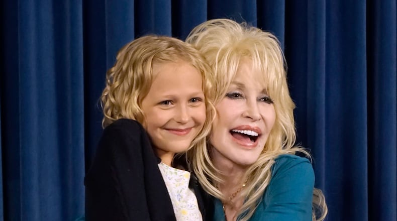 Alyvia Lind, who portrayed little Dolly Parton, and the grown-up Dolly. Photo: DollyParton.com