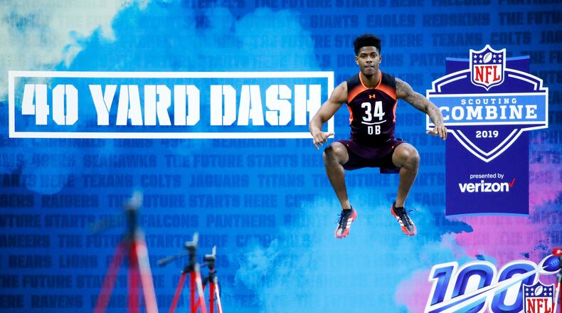 Greedy Williamsjumps up to stretch before running the 40-yard dash during the 2019 NFL combine.