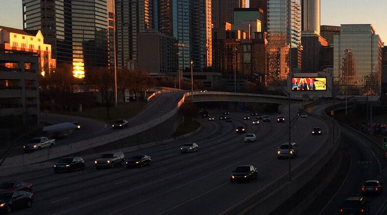 The Downtown skyline glows with the last rays of the setting sun. Ben Gray / @photobgray