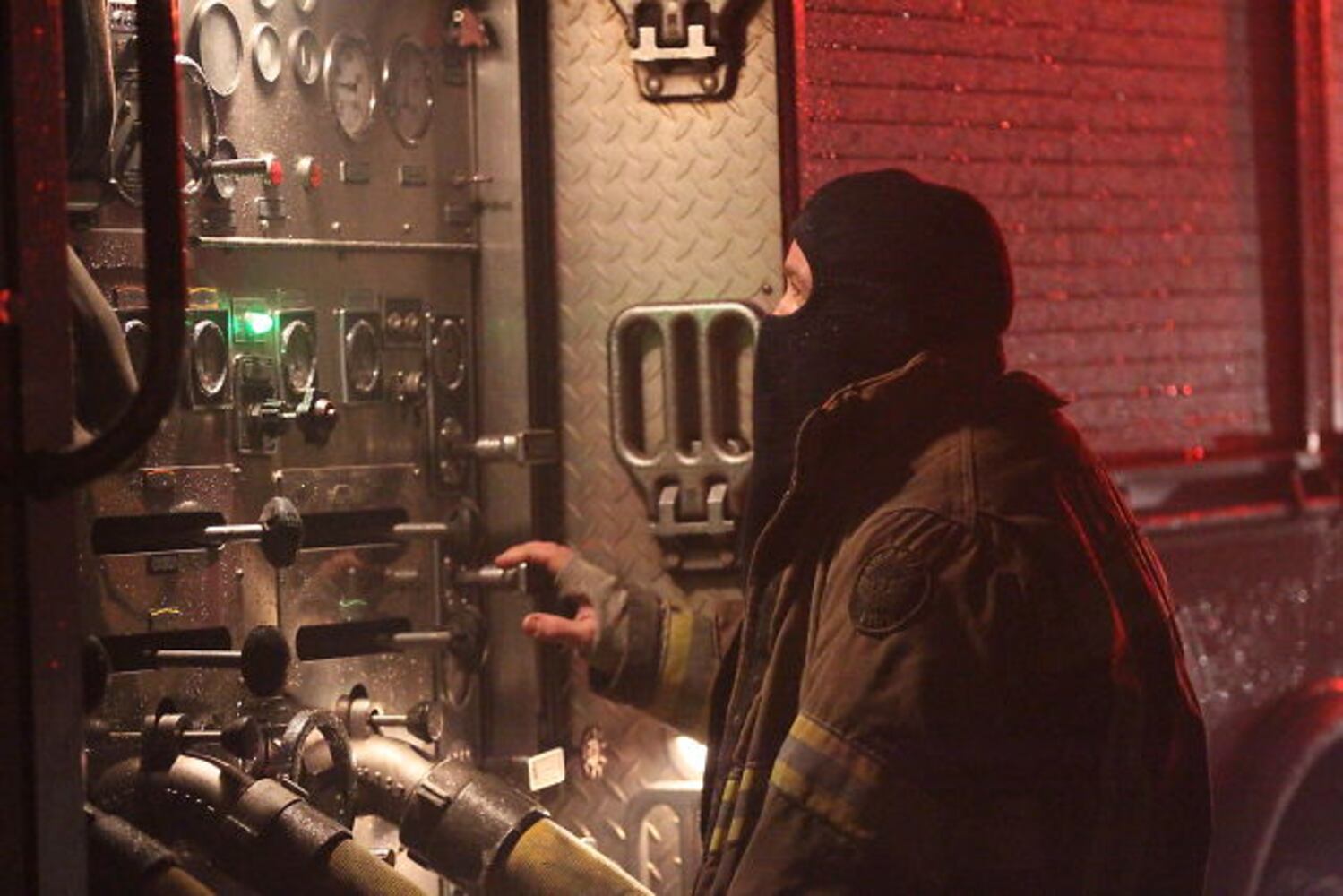 Firefighters contend with strong winds, cold weather