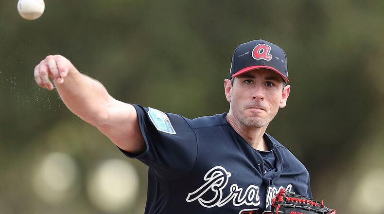 Braves pitcher Brandon McCarthy delivers a pitch during baseball spring training on Monday, Feb 19, 2018, at the ESPN Wide World of Sports Complex in Lake Buena Vista, Fla. (Curtis Compton/Atlanta Journal-Constitution via AP)