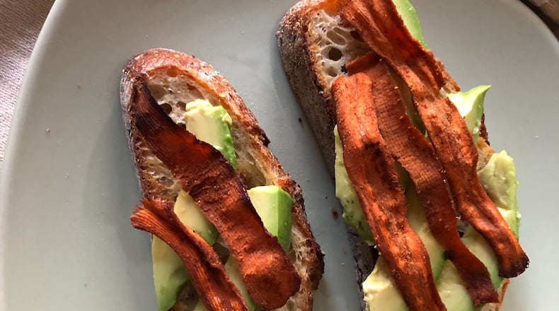 Avocado toast topped with carrot bacon. / C.W. Cameron for The Atlanta Journal-Constitution