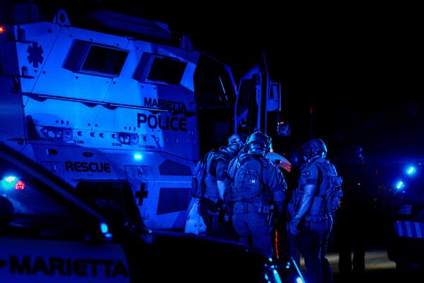 A Marietta SWAT team was called Sunday to a neighborhood off Cunningham Road after a man was fatally shot.