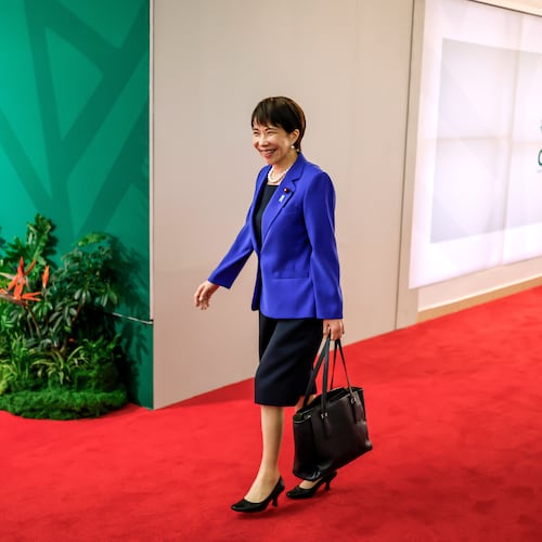 Japan's Prime Minister Sanae Takaichi arrives for the second day of the G20 Leaders' Summit, in Johannesburg, South Africa, Sunday, Nov. 23, 2025. (Marco Longari/Pool Photo via AP)