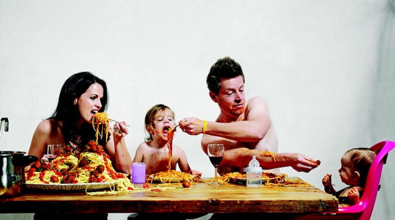 Family dinner: Jazmin, Riley, Richard and Embry Blais dig into Spaghetti with Meatballs during a photo shoot for "Try This at Home," by the Atlanta-based chef. Reprinted from the book "Try This At Home." Copyright 2013 by Richard Blais. Photographs copyright 2013 by John Lee. Published by Clarkson Potter, a division of Random House, Inc.