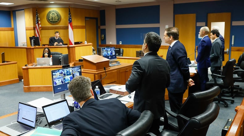Fulton County Superior Court Judge Robert McBurney presides over a hearing Tuesday for a lawsuit that opposes a rule the State Election Board’s recently approved requiring an election night hand count of ballots. (Miguel Martinez/AJC)