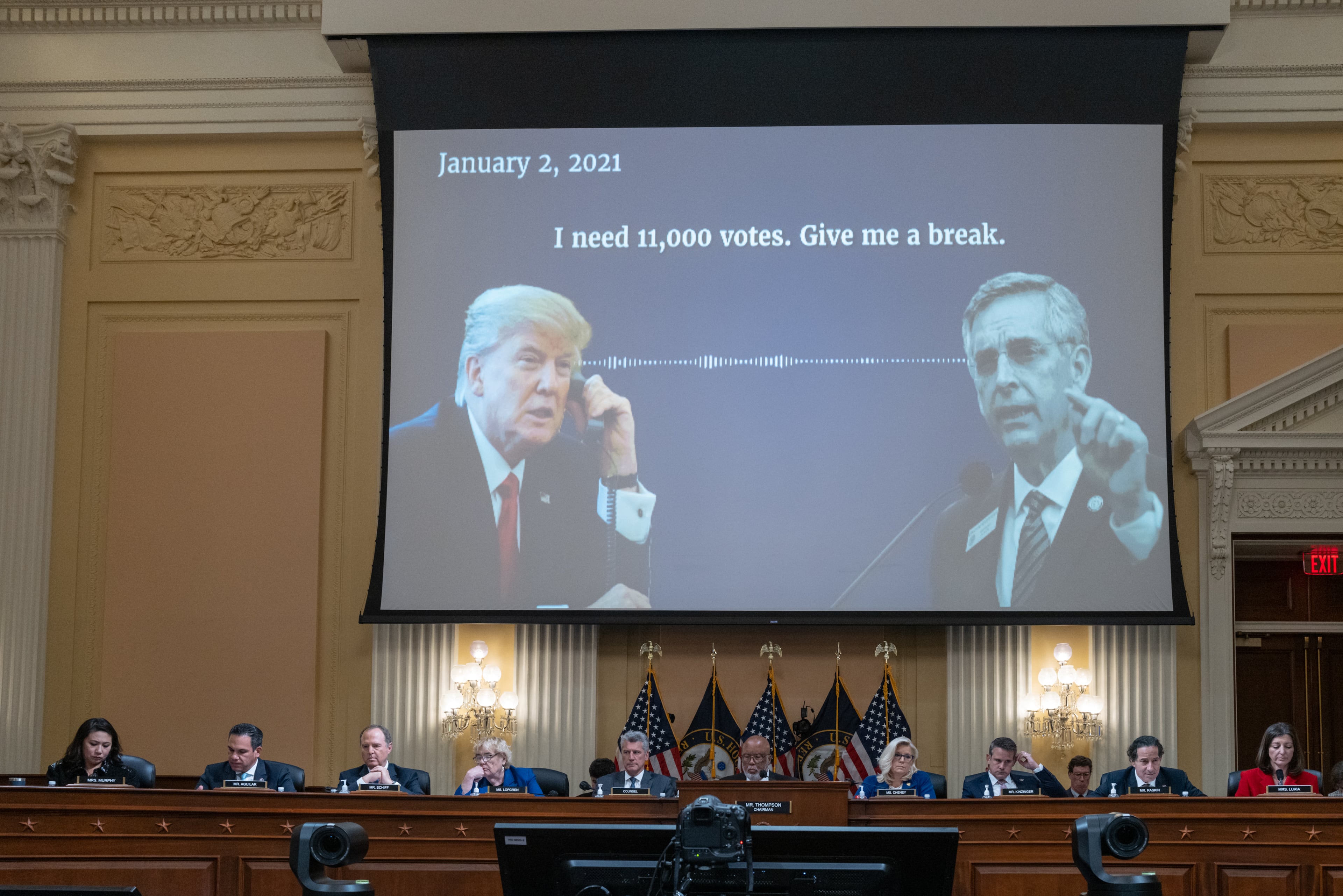 An audio recording of former President Donald Trump talking to Georgia Secretary of State Brad Raffensperger is played during a hearing by the House Select Committee to Investigate the Jan. 6 Attack on the U.S. Capitol, in Washington, Oct. 13, 2022. The criminal investigation of Trump and his allies in Georgia has its roots in activities that began shortly after Trump lost the 2020 election to Joe Biden. (Cheriss May/The New York Times)