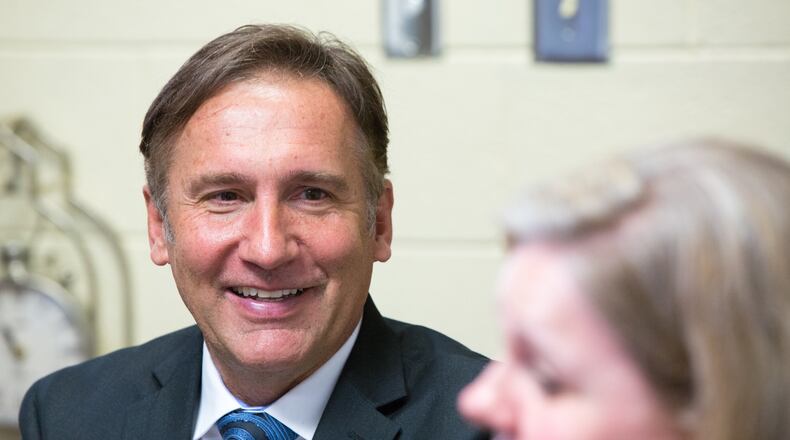 Incoming Fulton County Schools Superintendent Mike Looney laughs as he speaks with Jennifer Burton, principal of Evoline C. West Elementary School, after he finishes touring the school during their summer school program in Fairburn, Ga., on Thursday, June 13, 2019. Looney's first official day on the job is Monday, June 17. Starting Monday, June 17, Looney will lead Georgia's fourth largest school district, which has a general fund budget of more than $1 billion. (Casey Sykes for The Atlanta Journal-Constitution)