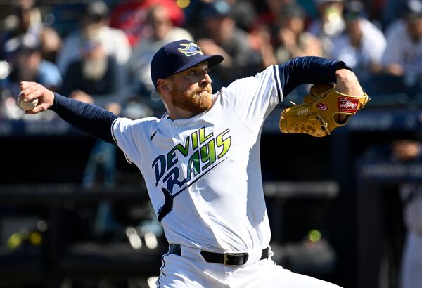 Tampa Bay Rays pitcher Drew Rasmussen (57) throws during the first inning of a baseball game against the Atlanta Braves, Saturday, April 12, 2025, in Tampa, Fla. (AP Photo/Jason Behnken)