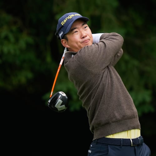 Michael Kim, of South Korea, watches his tee shot on the fourth hole during the first round of the PGA Championship golf tournament practice round at Aronimink Golf Club, Thursday, May 14, 2026, in Newtown Square, PA. (AP Photo/Matt Slocum)