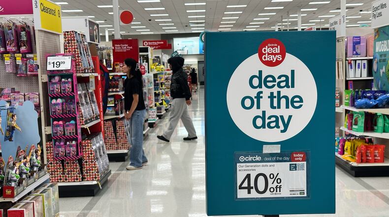 A sale information sign is displayed at a retail store in Wheeling, Ill., Thursday, June 25, 2026. (AP Photo/Nam Y. Huh)