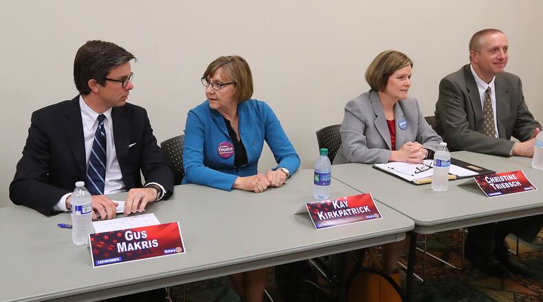 Candidates Gus Makris (from left), Kay Kirkpatrick, Christine Triebsch and Bob Wiskind participate in a debate for the open state Senate seat that was held by Judson Hill at the East Cobb Library on April 12. Triebsch and Kirkpatrick made their way to the runoff on May 16. Curtis Compton/ccompton@ajc.com