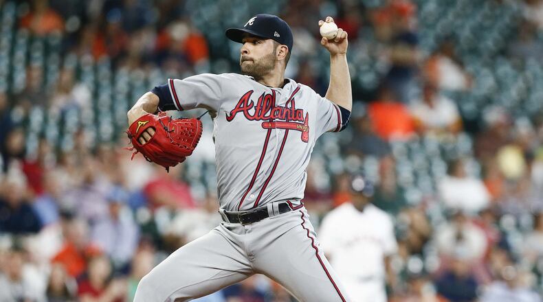 Braves starting pitcher Jaime Garcia pitches in the first inning against the Houston Astros at Minute Maid Park on Wednesday in Houston. (Photo by Bob Levey/Getty Images)