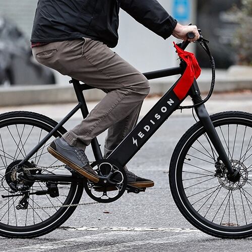 A rider takes an e-bike for a spin in 2022. (Natrice Miller/AJC 2022)