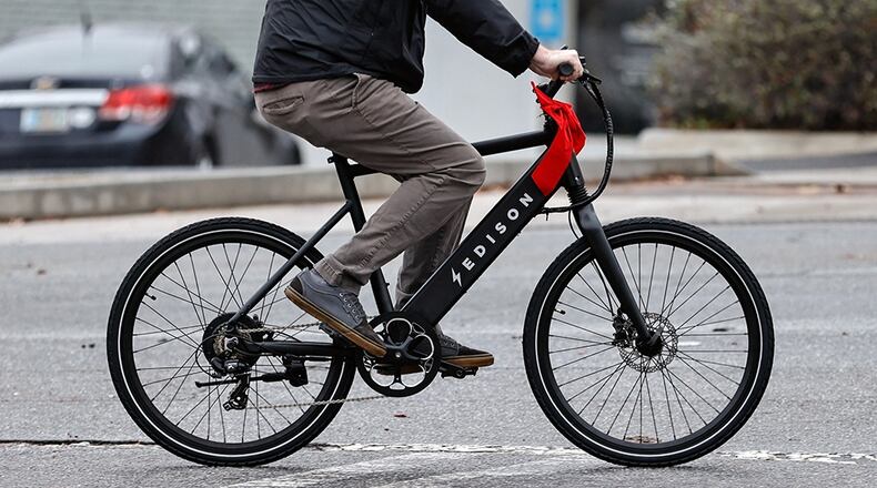 A rider takes an e-bike for a spin in 2022. (Natrice Miller/AJC 2022)