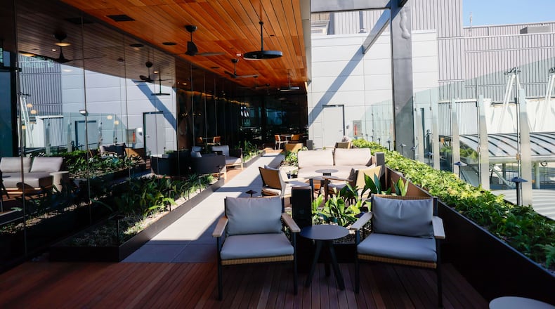 The American Express Centurion Lounge at Hartsfield-Jackson International Airport opened in February, featuring a locally-inspired menu curated by Atlanta-based chef Deborah VanTrece, a whiskey bar and outdoor terraces. (Miguel Martinez/AJC 2024)