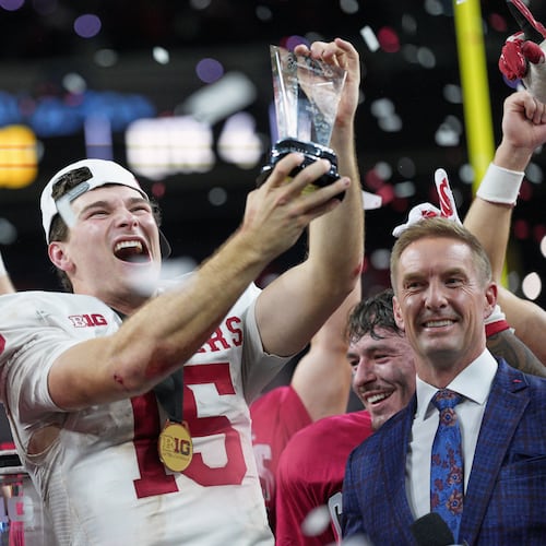 Indiana's Fernando Mendoza celebrates after the Big Ten championship NCAA college football game against Ohio State in Indianapolis, Saturday, Dec. 6, 2025. (AP Photo/AJ Mast)