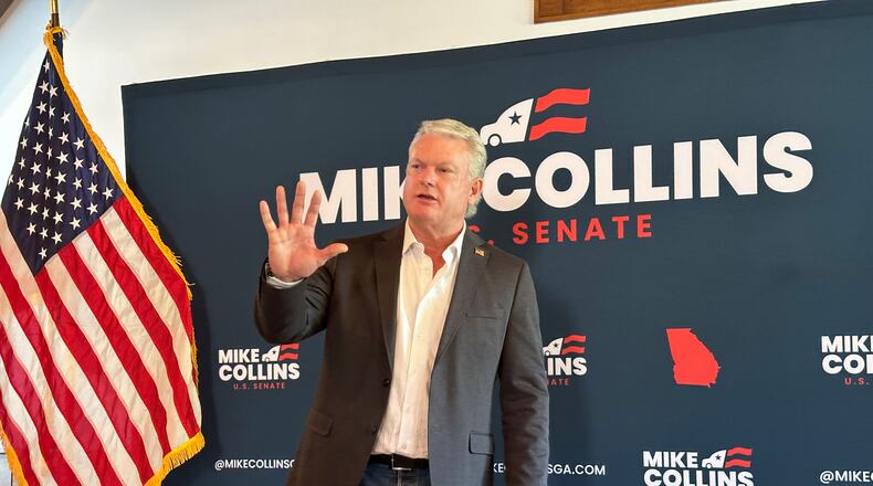 U.S. Rep. Mike Collins, R-Ga., speaks to supporters in Acworth, Ga., on Monday, May 4, 2026. (AP Photo/Jeff Amy)