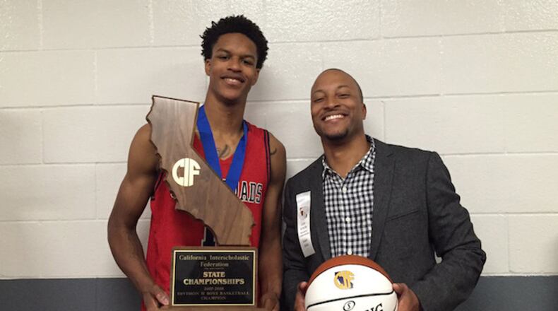 Shareef O'Neal poses with assistant coach Thomas Scott after Crossroads of Santa Monica, Calif., won the CIF State Division II championship on March 23, 2018. (Ailene Voisin/Sacramento Bee/TNS)