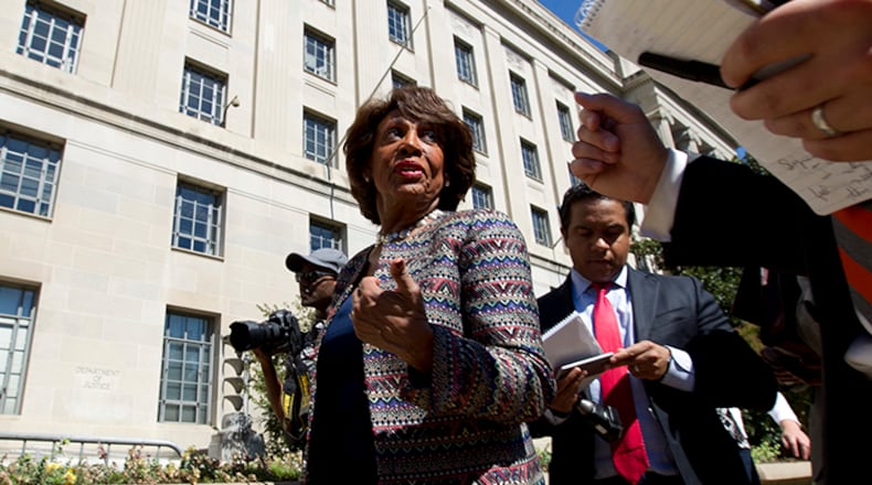 In this Sept. 22, 2016 file photo, Rep. Maxine Waters D-Calif., accompanied by other members of the Congressional Black Caucus (CBC), speaks to the media outside of the Justice Department in Washington. Waters has served in Congress for a quarter-century. Now she's turned into the passionate voice of resistance against the Trump administration.