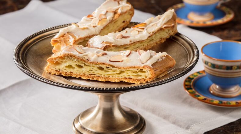 A layer of almond-paste-accented dough is sandwiched between two layers of another dough to make this flaky, rich kringle. (Zbigniew Bzdak/Chicago Tribune/TNS)