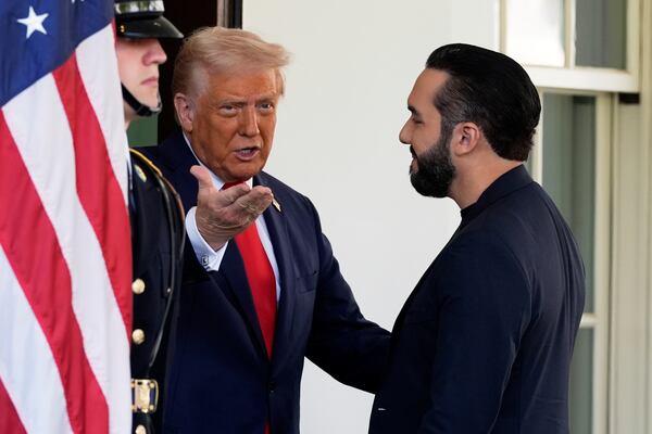 President Donald Trump greets El Salvador's President Nayib Bukele as he arrives at the West Wing of the White House, Monday, April 14, 2025, in Washington. (AP Photo/Alex Brandon)