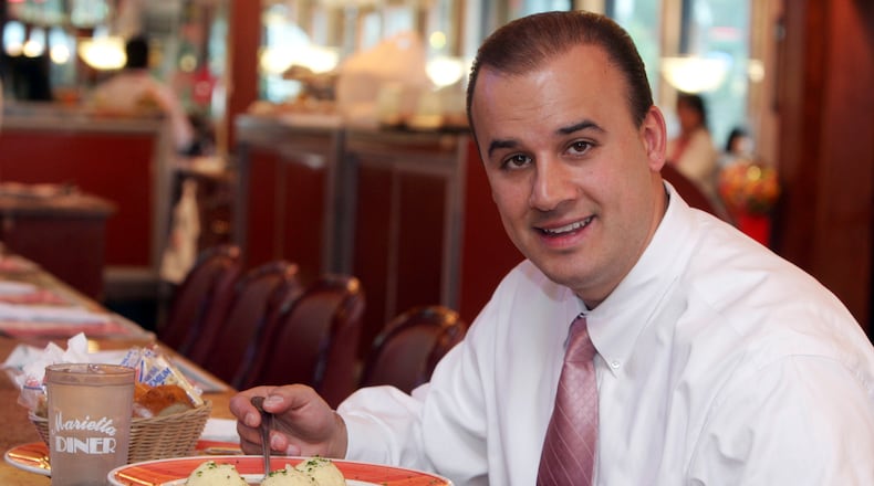 Marietta Diner owner Gus Tselios with a bowl of Matzoh Ball soup October 17, 2007. (Brant Sanderlin/AJC staff)