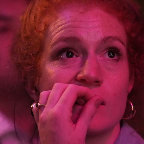 An attendee reacts to election results during a primary election night event for Abdul El-Sayed, a progressive candidate in the Democratic primary for U.S. Senate in Michigan, Wednesday, Aug. 5, 2026, at the Majestic Theatre in Detroit. (AP Photo/Julia Demaree Nikhinson)