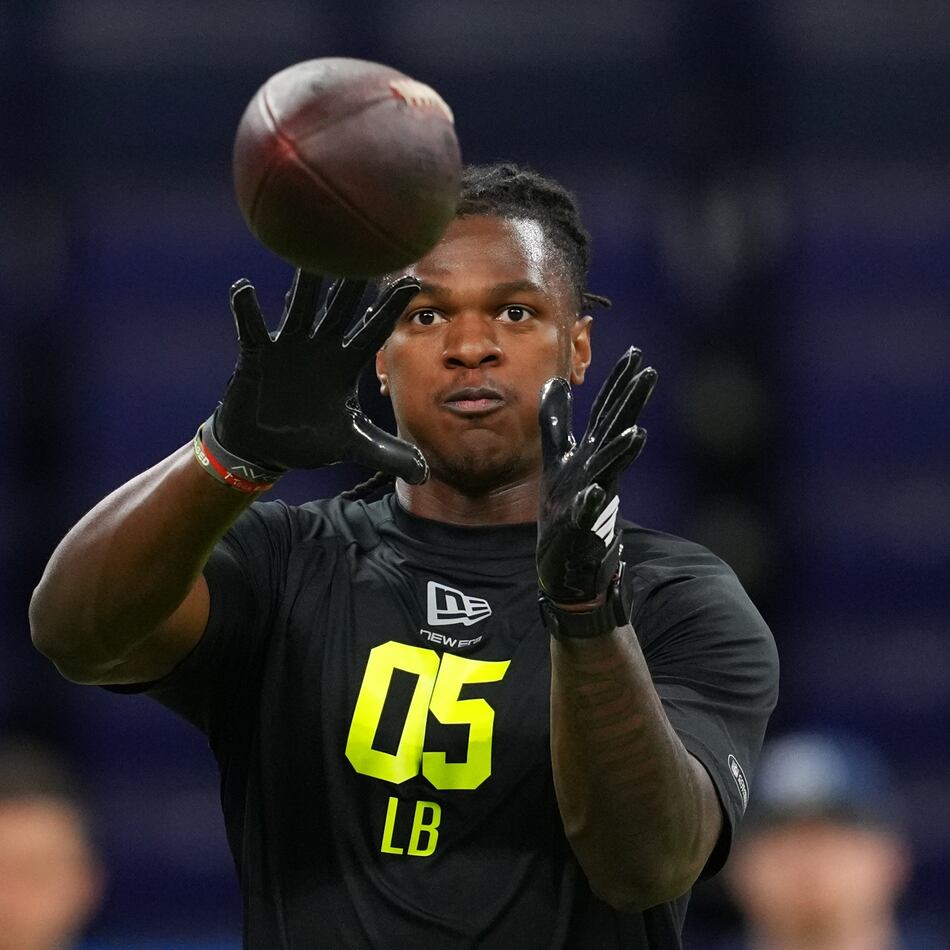 Falcons rookie linebacker Kendal Daniels — picturing during the NFL scouting combine in February — is recovering from a calf injury, but he is developing quickly in the position group. (Julio Cortez/AP)