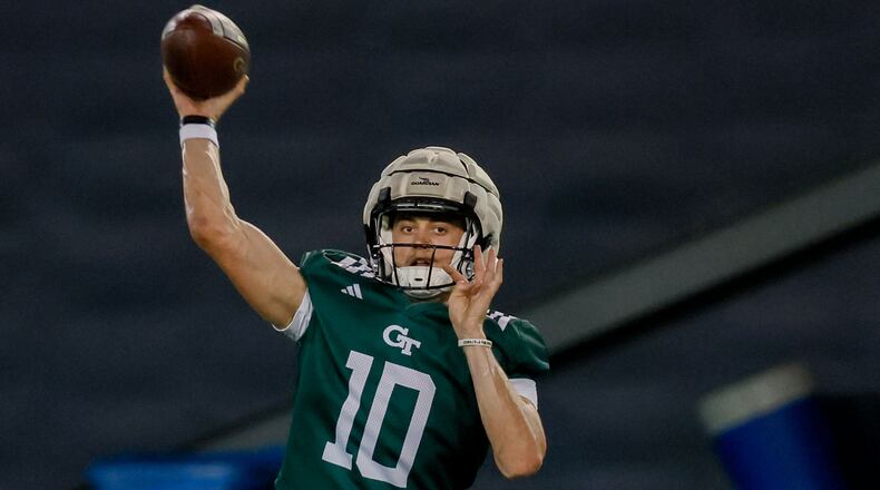 Georgia Tech quarterback Haynes King (10) attempts a pass to a wide receiver during the second day of football practice at the Brock Indoor Practice Facility on Thursday, July 25, 2024, in Atlanta. (Miguel Martinez / AJC)