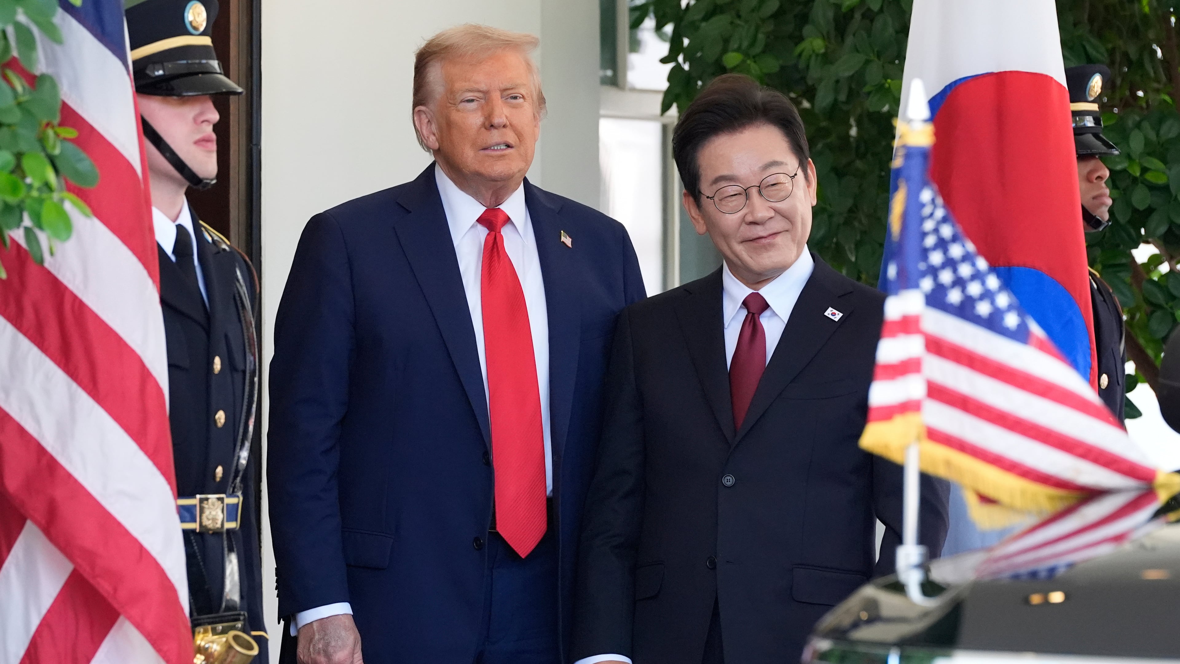 FILE - President Donald Trump, left, greets South Korean President Lee Jae Myung upon his arrival at the White House, on Aug. 25, 2025, in Washington. (AP Photo/Alex Brandon, File)