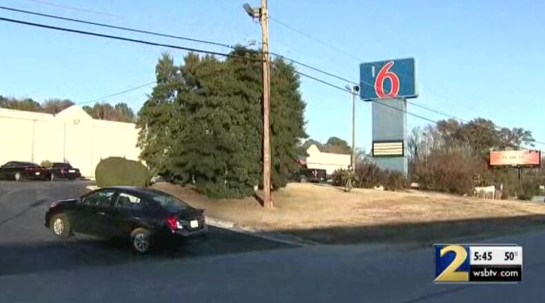 A suspect who allegedly traded gunfire with deputies in South Georgia is accused of stabbing a woman to death Monday morning, police said.