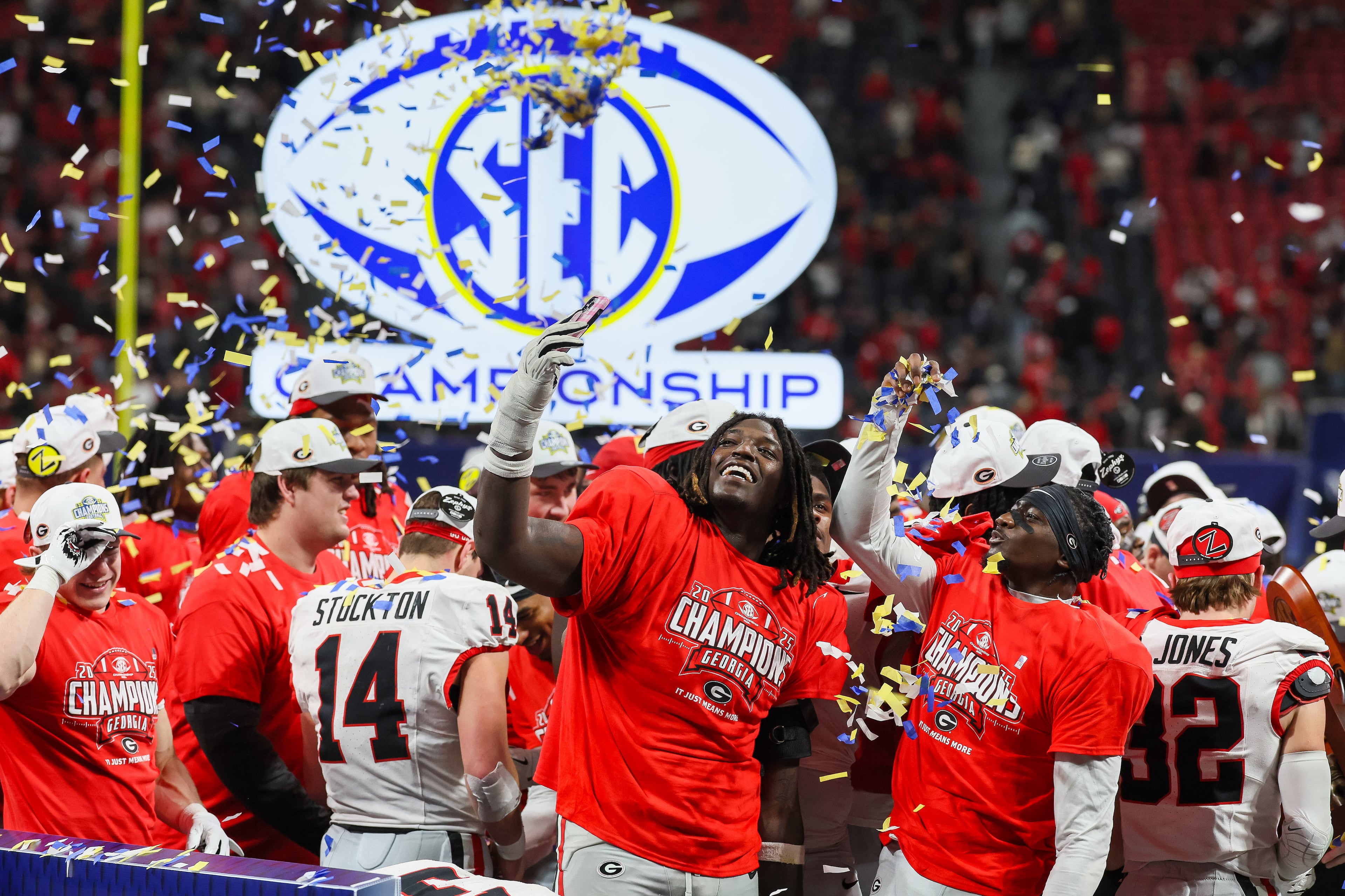 Georgia celebrates a 28-7 victory over Alabama in the SEC Championship game at Mercedes-Benz Stadium, Saturday, Dec. 6, 2025, in Atlanta. (Jason Getz / AJC)