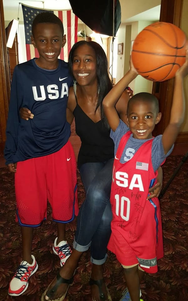 A young Kanon Catchings was at the 2016 Olympics with his brother, Kolton, and mom, Tauja (center) to support the boys' aunt, WNBA star Tamika Catchings. (Courtesy of Tauja Catchings)