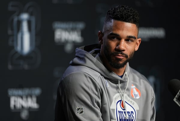 Edmonton Oilers' Evander Kane pauses while speaking during a news conference for the NHL hockey Stanley Cup Finals. Thursday, June 5, 2025, in Edmonton, Alberta. (Darryl Dyck/The Canadian Press via AP)