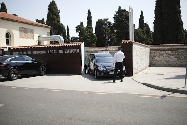 A funeral car is parked inside the forensic anatomical institute, where the bodies of the Liverpool player Diogo Jota and his brother killed in a car accident are being held, in the northwestern city of Zamora, Spain, Thursday, July 3, 2025. (AP Photo/Paloma V. Escarpa)