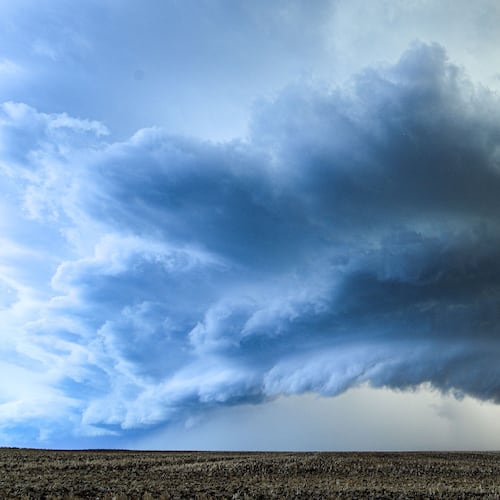 A thundercloud is moving over Lich in the Giessen district of central Hesse, Germany, Wednesday, Aug. 19, 2026. (Alexander Wolf/onw-images/dpa via AP)