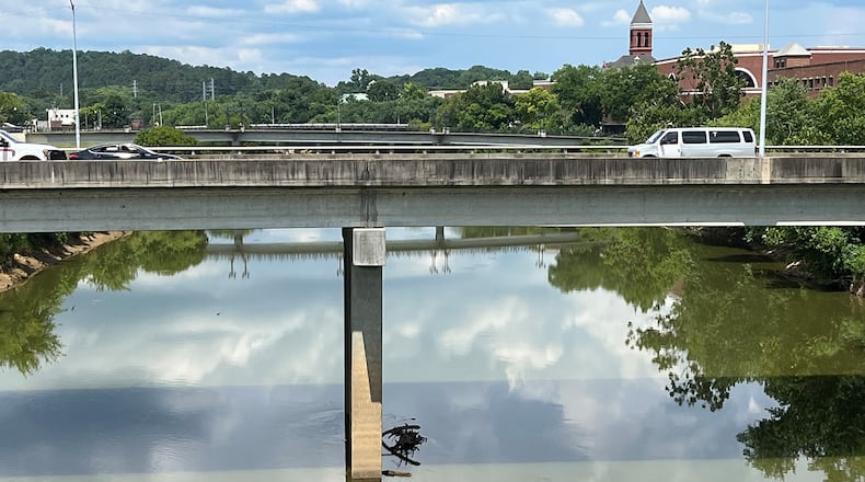 FILE: The Oostanaula and Etowah rivers meet in Rome, Georgia, near the bridge seen here. Six years ago, Rome officials were forced to switch the city’s water supply from the Oostanaula to the Etowah. The city is among 10 North Georgia communities where PFAS chemicals have been found in drinking water supplies at higher levels than the Environmental Protection Agency declares is safe. (Andy Miller/KHN)