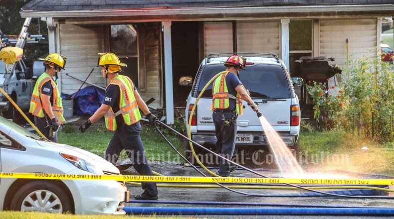A woman was killed in the fire in the 100 block of Kennesaw Street in the Buford area.