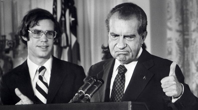In a photo dated Aug. 9, 1974, U.S. President Richard Nixon bids farewell to the White House staff. At left is his son-in-law David Eisenhower, who was married to Nixon's daughter Julie. (Consolidated News Pictures/AFP/Getty Images/TNS)