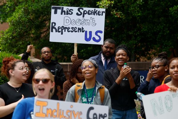 Students from the Morehouse School of Medicine rally outside their school on Wednesday. (Miguel Martinez/AJC)