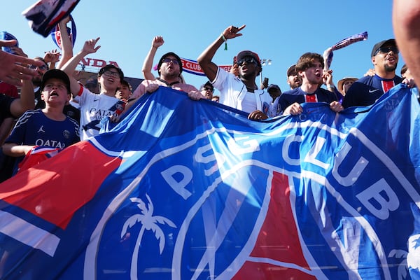 Paris Saint-Germain supporters react ahead of the Club World Cup group B soccer match between PSG and Botafogo in Pasadena, Calif., Thursday, June 19, 2025. (AP Photo/Greg Bull)