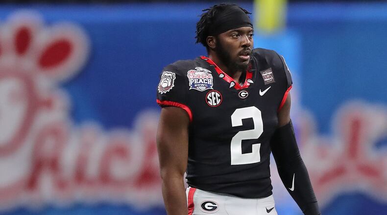 Georgia defensive back Richard LeCounte, who was injured in a motorcycle accident earlier in the season, prepares to play Cincinnati in the NCAA college football Peach Bowl game on Friday, Jan. 1, 2021, in Atlanta. Curtis Compton / Curtis.Compton@ajc.com���