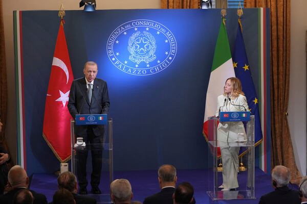 Turkish President Recep Tayyip Erdogan, left, and Italian Premier Giorgia Meloni address the media during a joint press conference at Villa Pamphilj in Rome, Tuesday, April 29, 2025. (AP Photo/Francisco Seco)